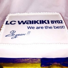 Белый торт с логотипом на фотопечати заказать в Минске.